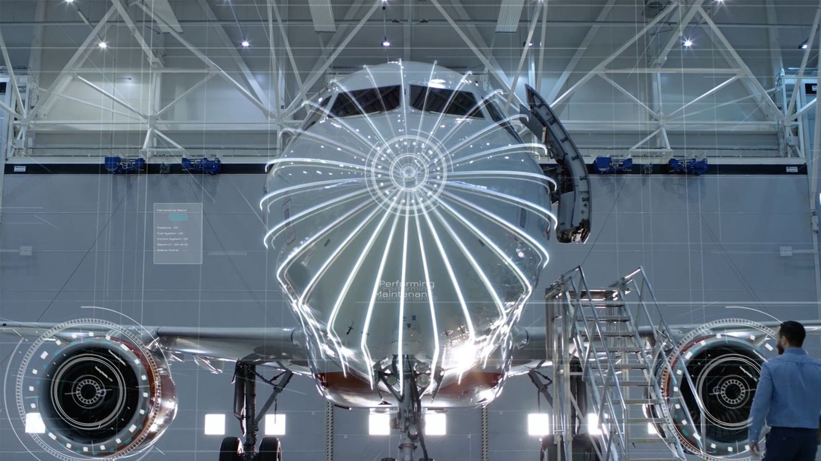 An aircraft in a hangar for maintenance