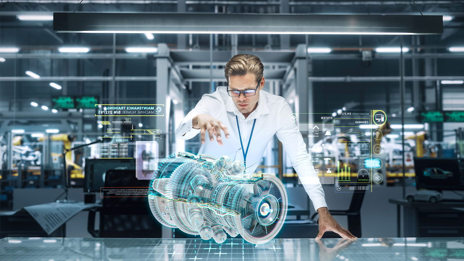 A man in a lab manipulating a virtual engine