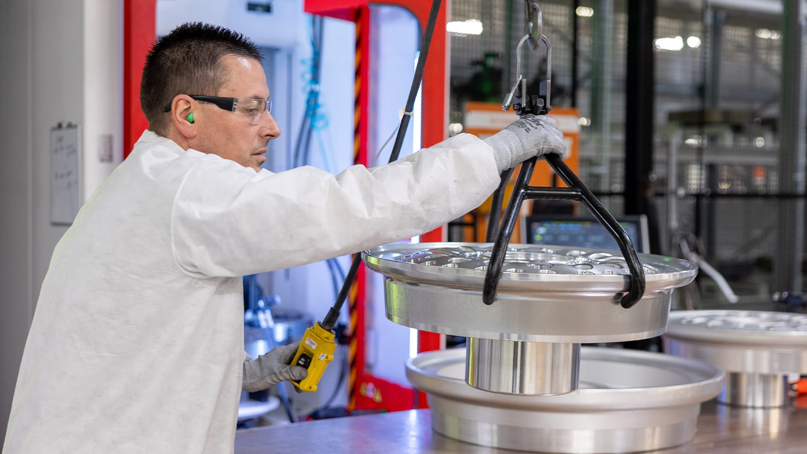 An operator at Collins Aerospace Advanced Structures in Troy, Ohio, uses a single multitask machine for all wheel machining operations.