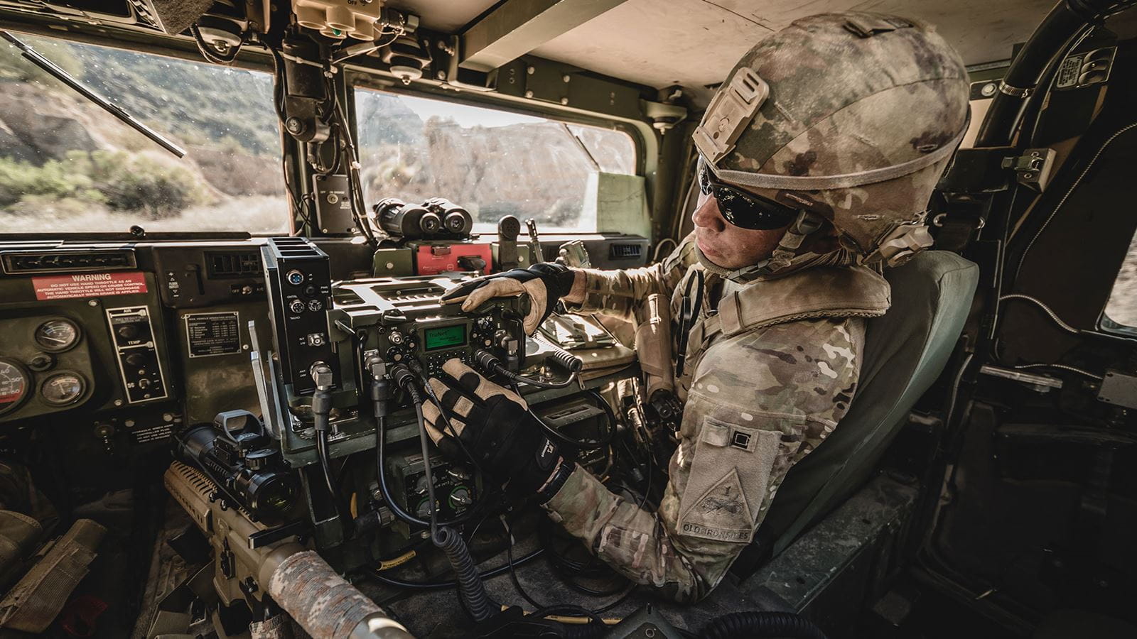 Soldier inside military vehicle