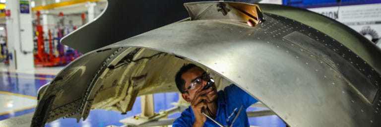 Nacelle mechanic inspecting