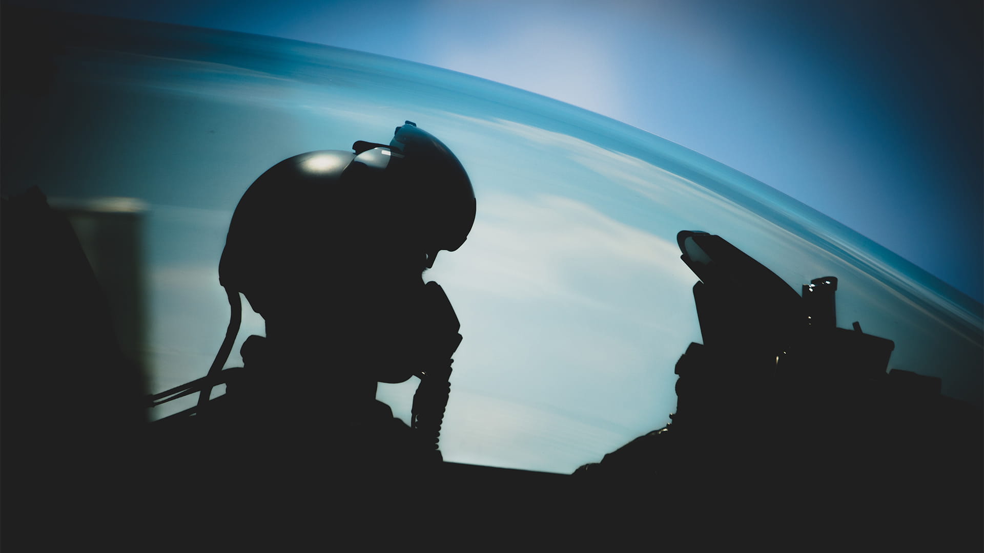 Pilot in plane side profile silhouette