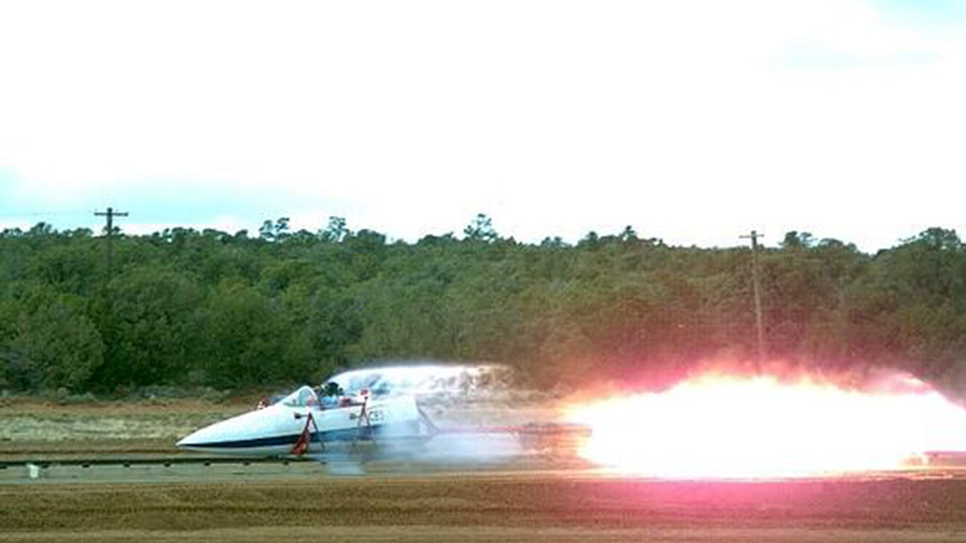 Plane shooting jet flames