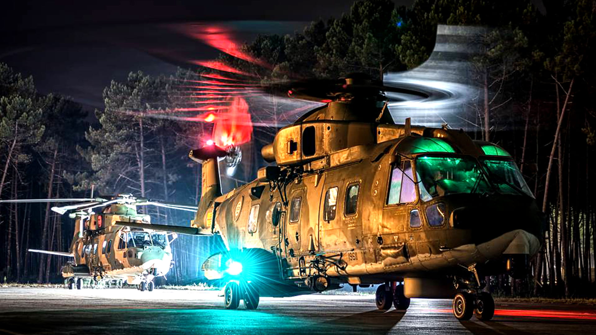 Night shot of military helicopters