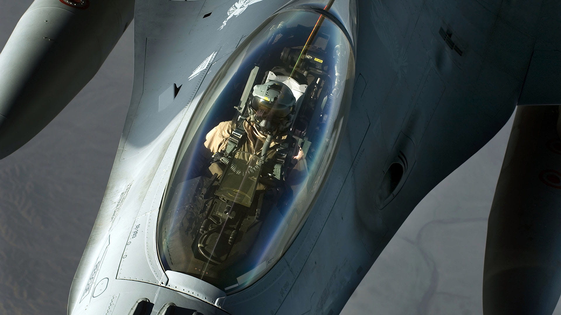 F-16 fighter jet with pilot