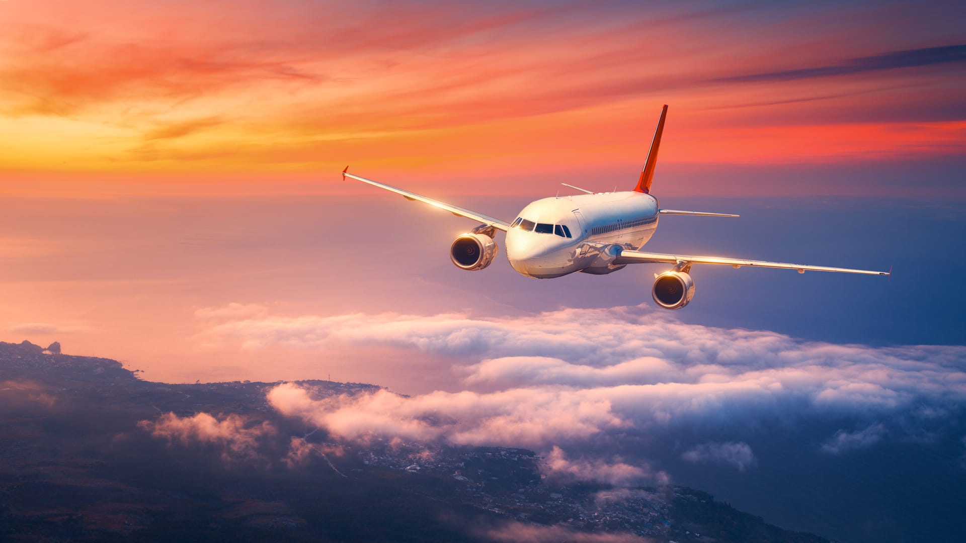 Plane flying in dusk