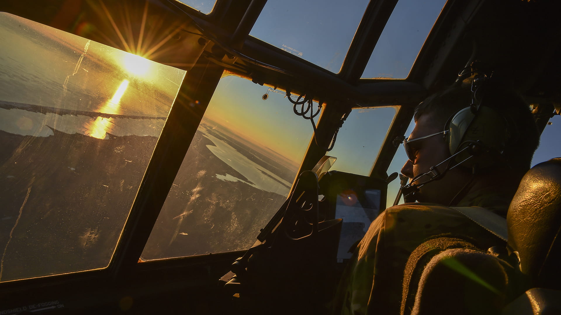 Pilot looking out of aircraft