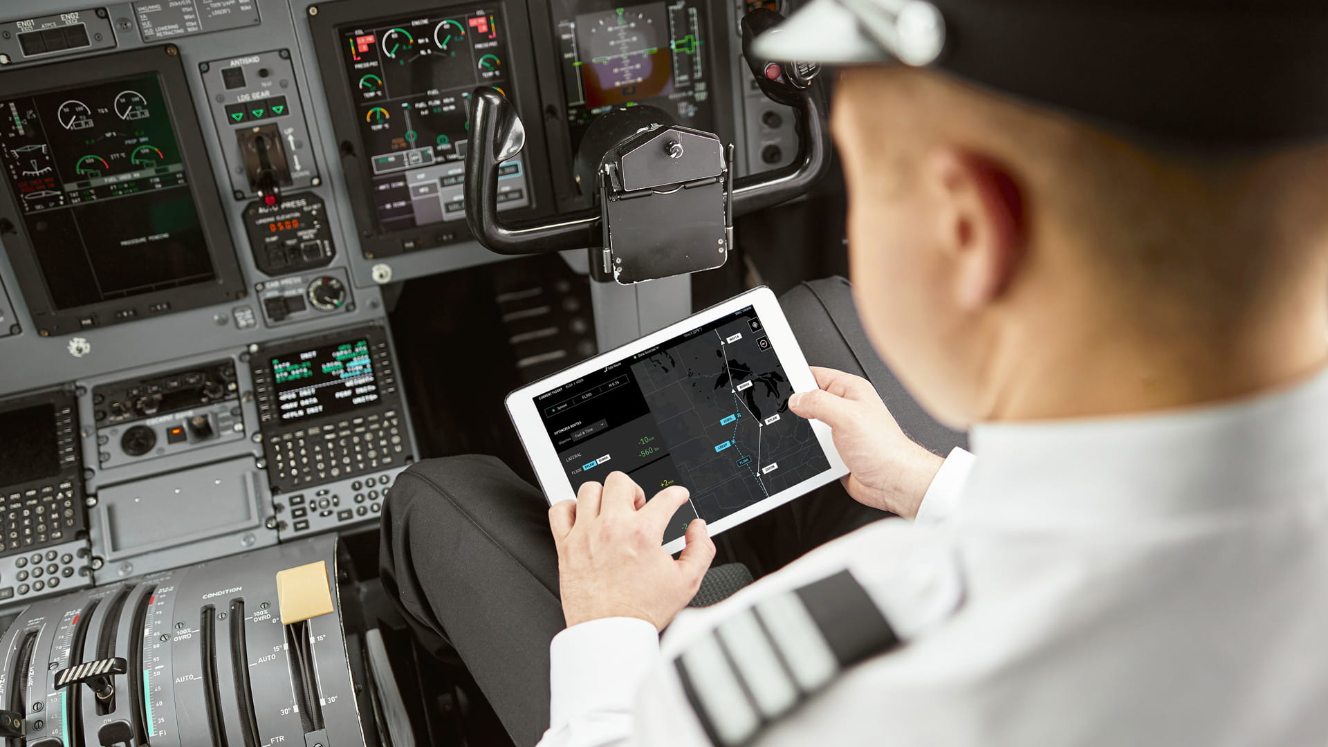 A pilot using a tablet