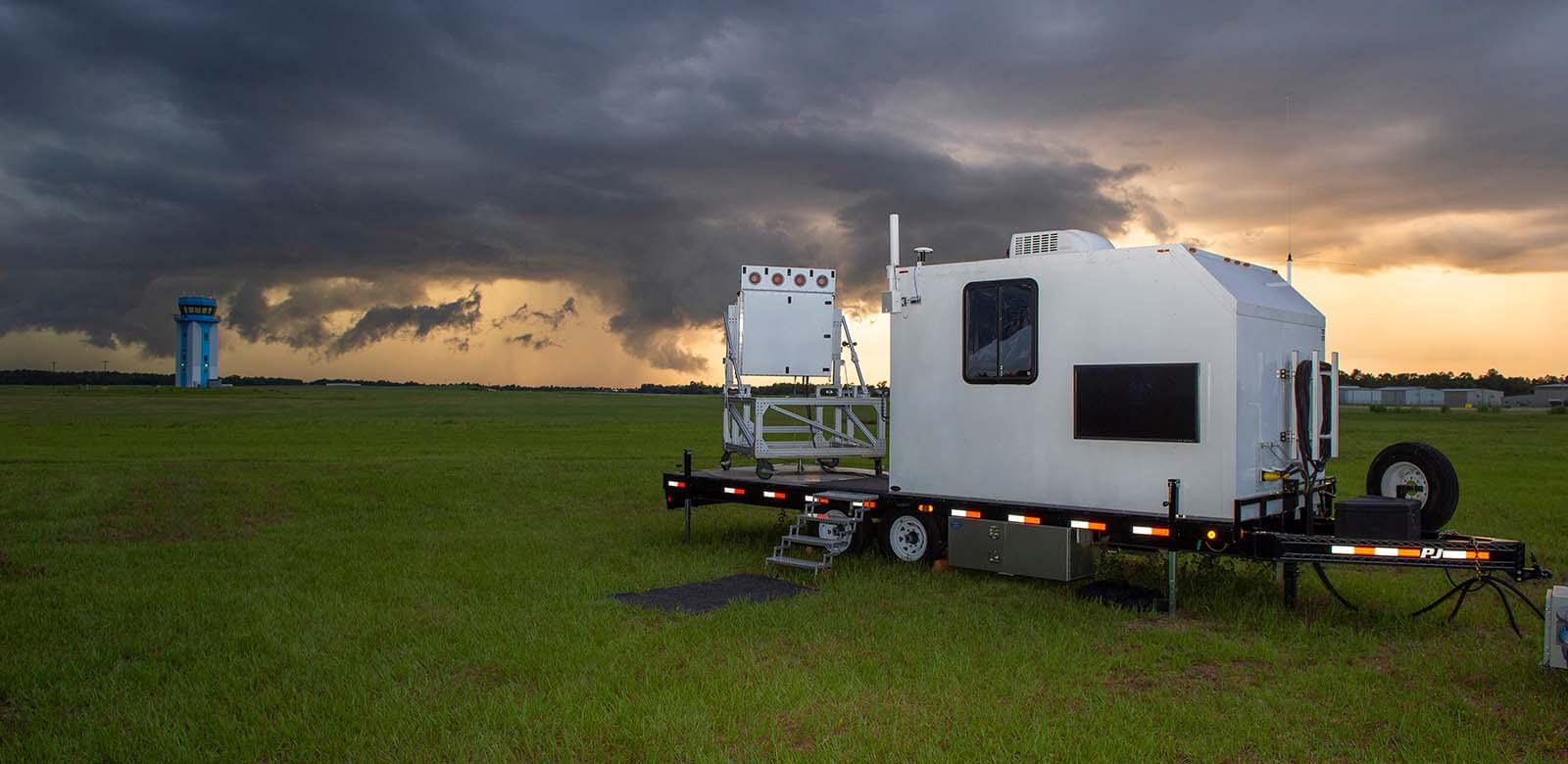 a trailer with a radar unit surveilling the airspace