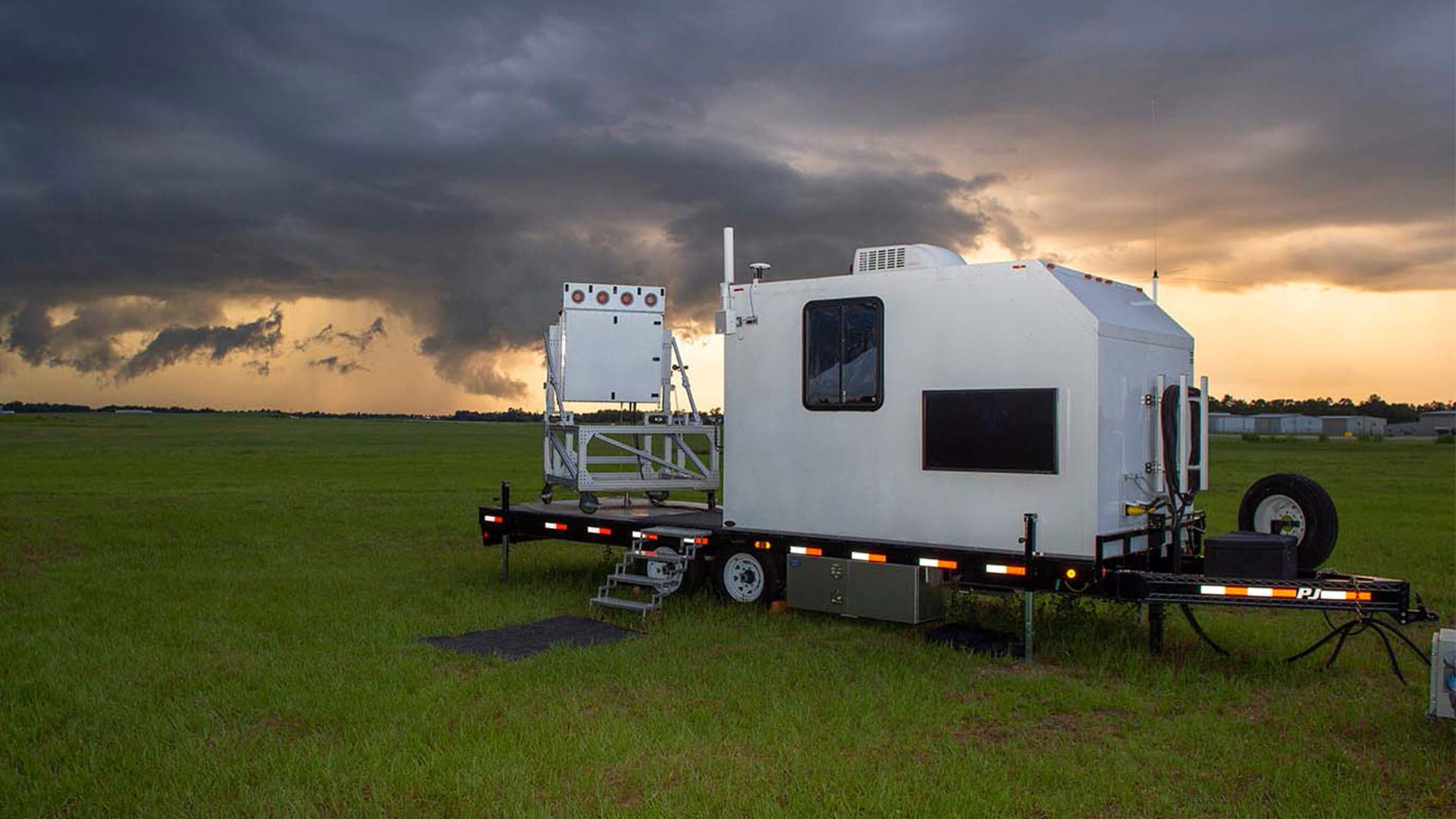 a trailer with a radar unit surveiling the airspace