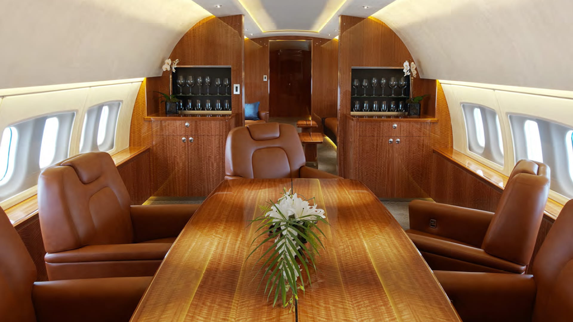 a conference room with chairs in an airline