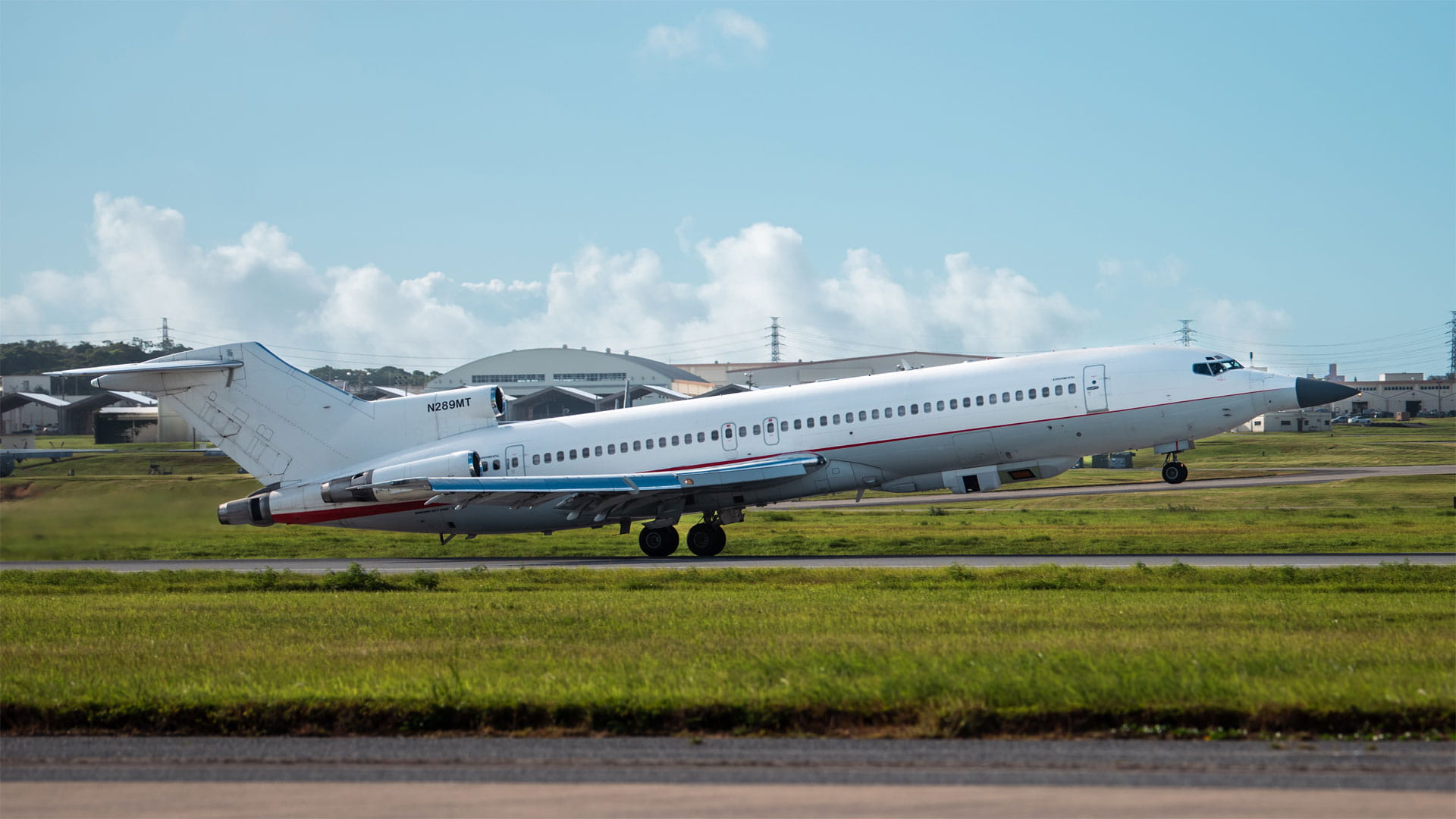 The Raytheon Multi-Program Testbed aircraft prepares for takeoff