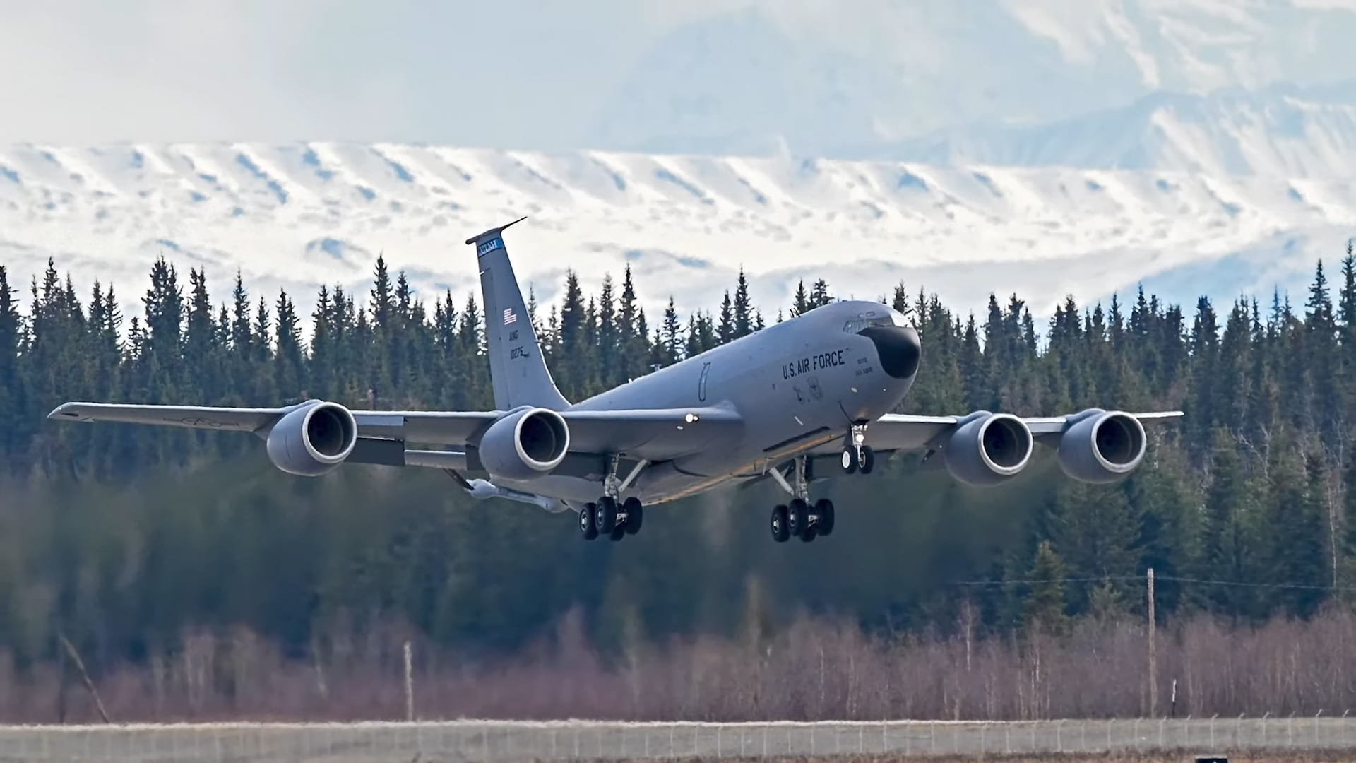 A military tanker transport aircraft at landing