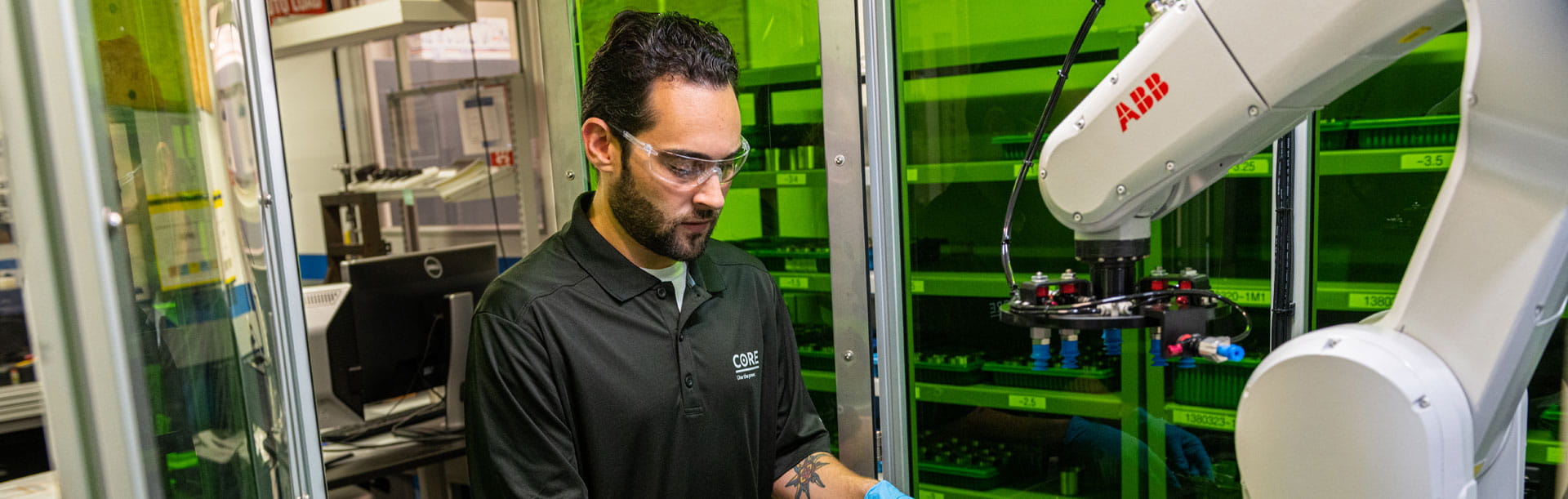 A man placing a circuit board