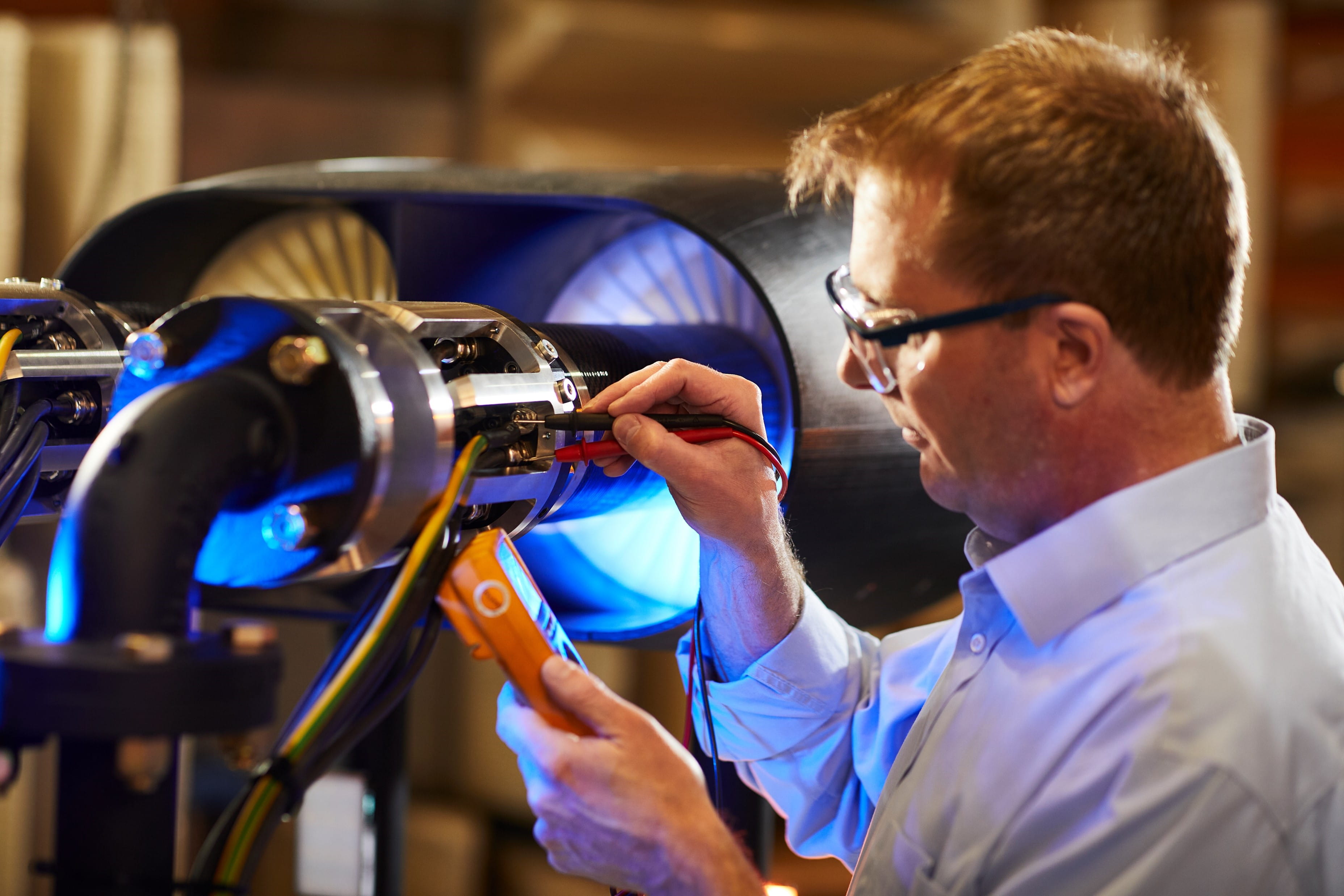 An engineer tests a propulsor