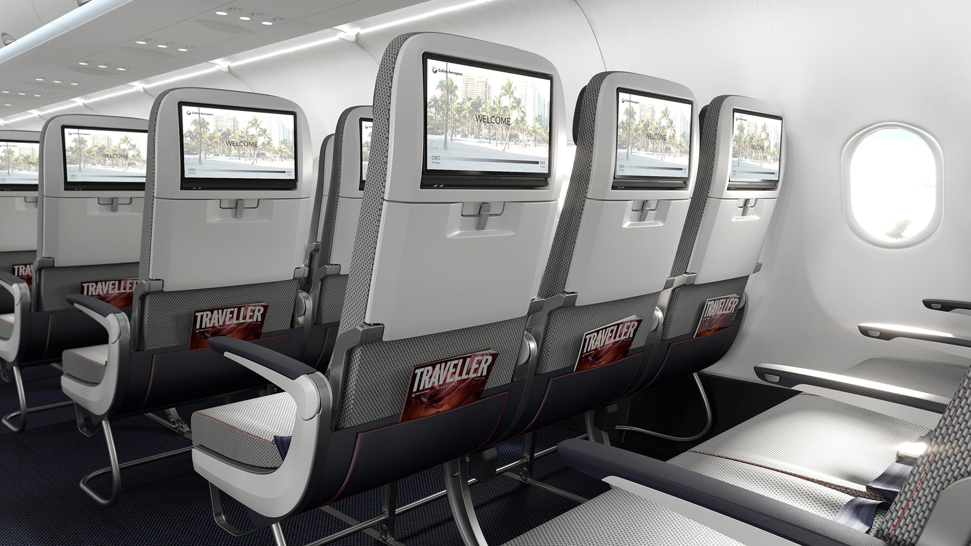 Rear view of multiple rows of aircraft seats. The word Welcome is visible on the seatback entertainment system. A copy of Traveler magazine sits in the seatback pocket of each seat.