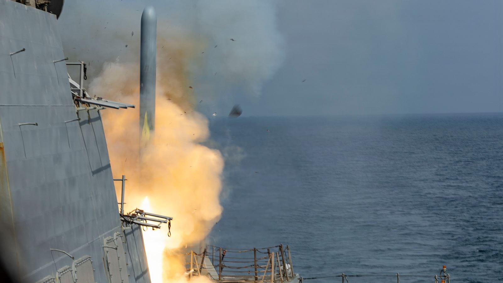 A Tomahawk missile firing from a ship