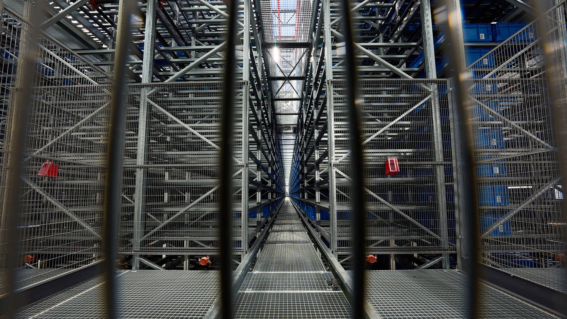 Interior of a warehouse showing racks and shelving