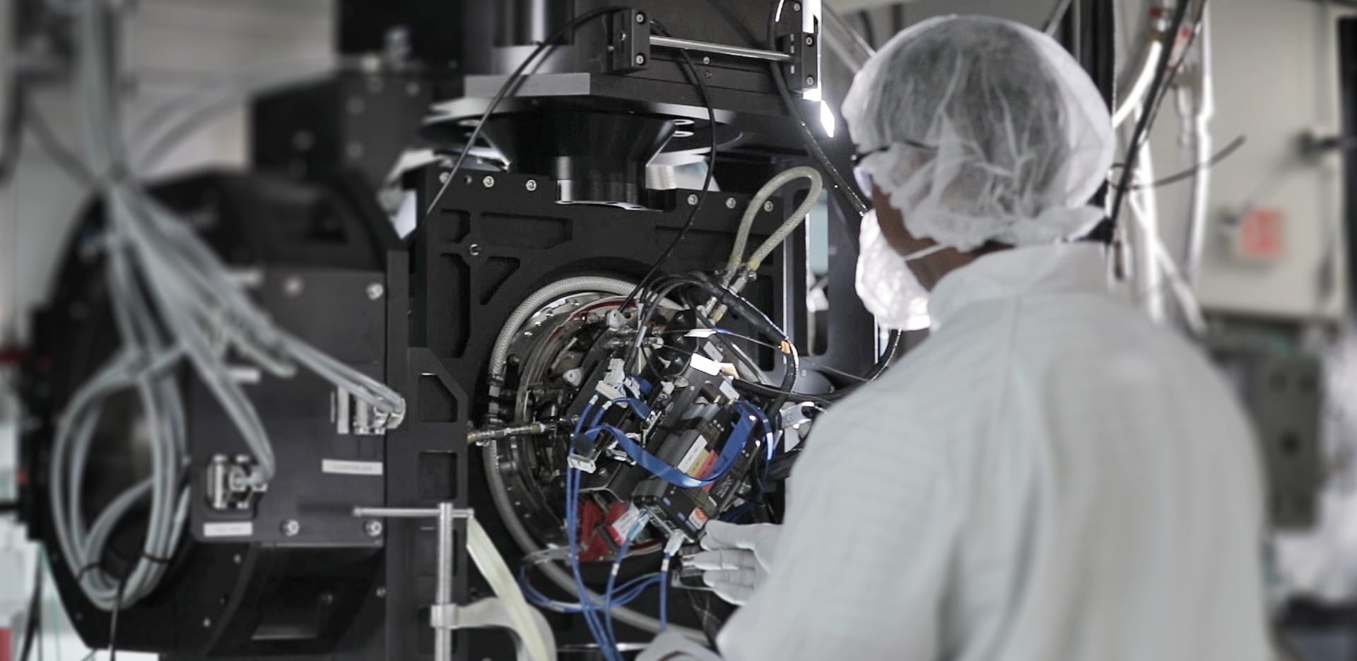 An employee works on a machine