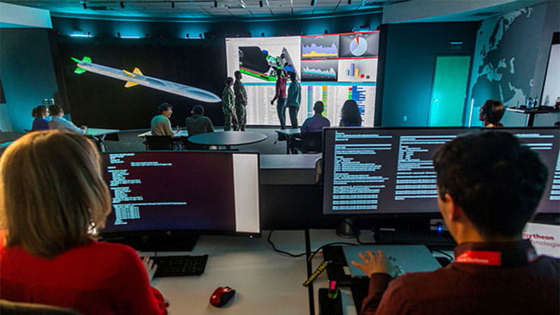 software developers in a control tower