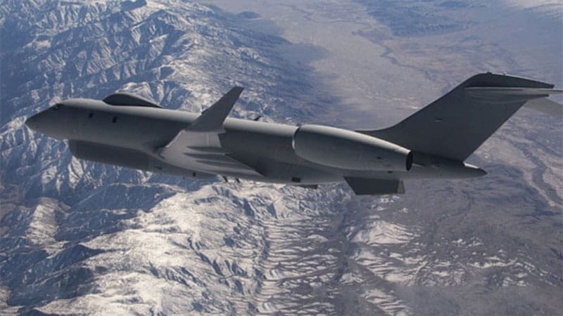 gray stealth aircraft flying above white clouds