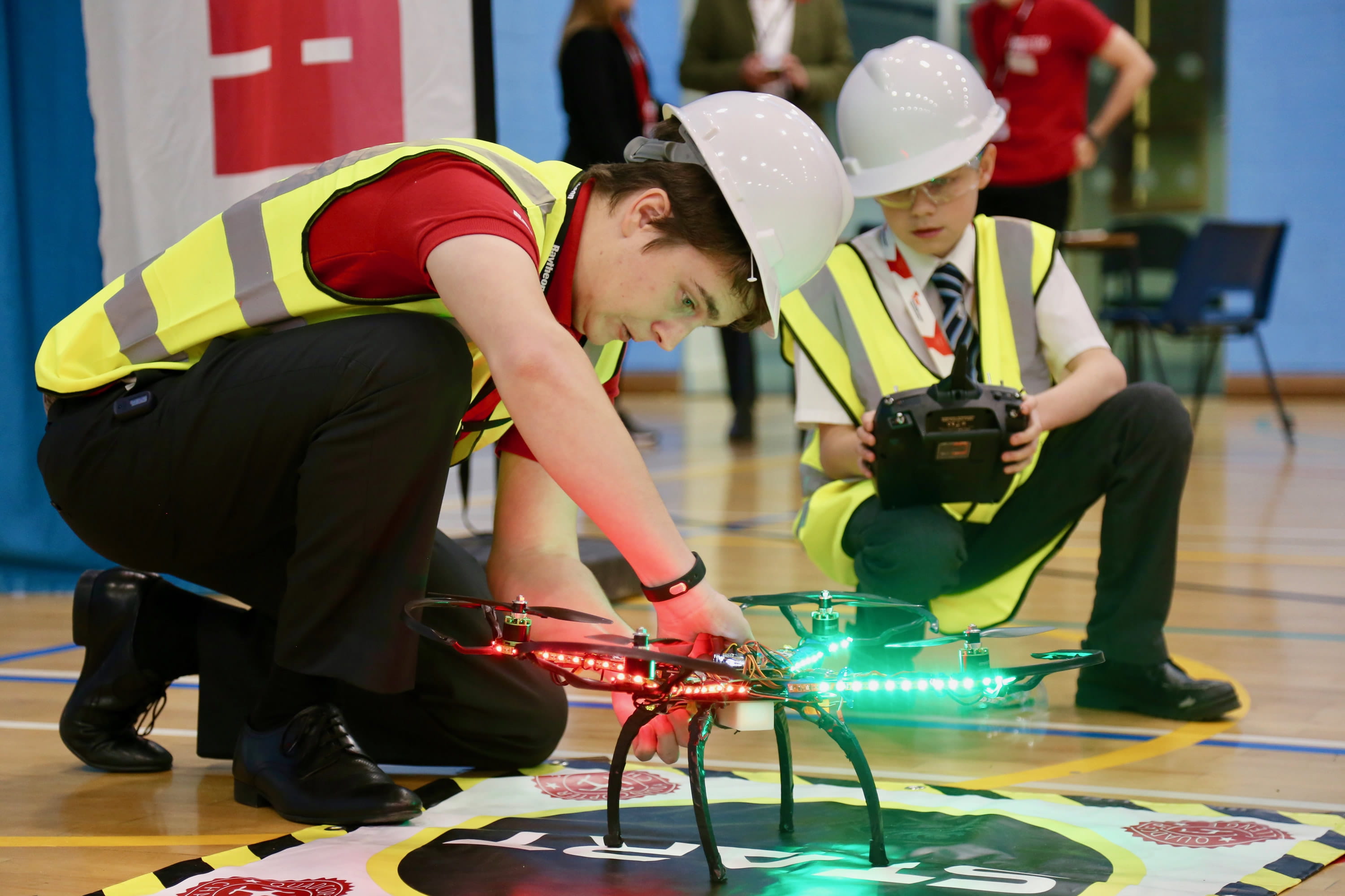 Team members prepare their quadcopter to fly during the 2017 Raytheon UK Quadcopter Challenge regional competition. The event is designed to show young people that a career in engineering can be as hands-on as they may enjoy.