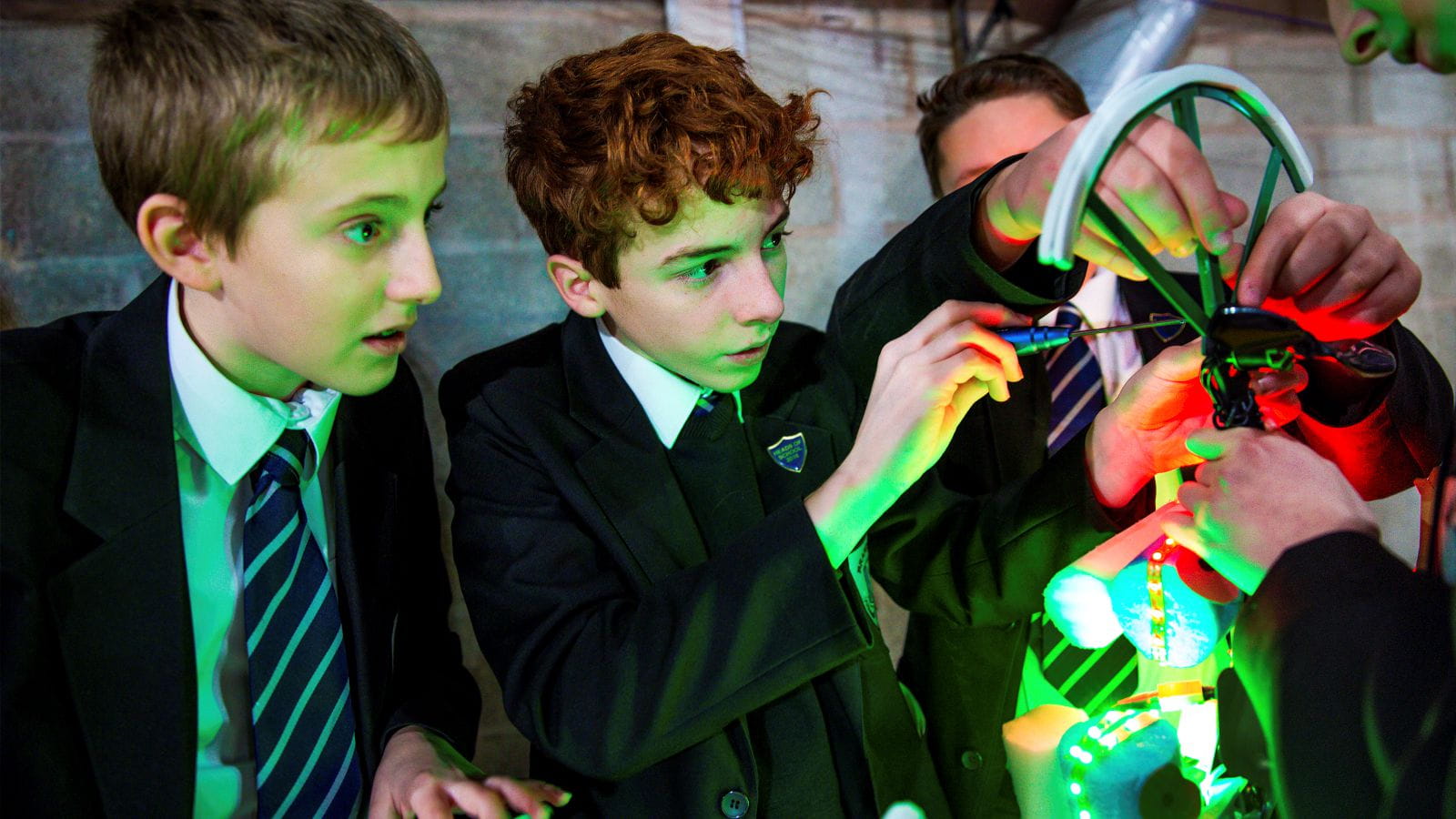 Winners of the 2017 Raytheon UK Quadcopter Challenge, put the finishing touches on their quadcopter.