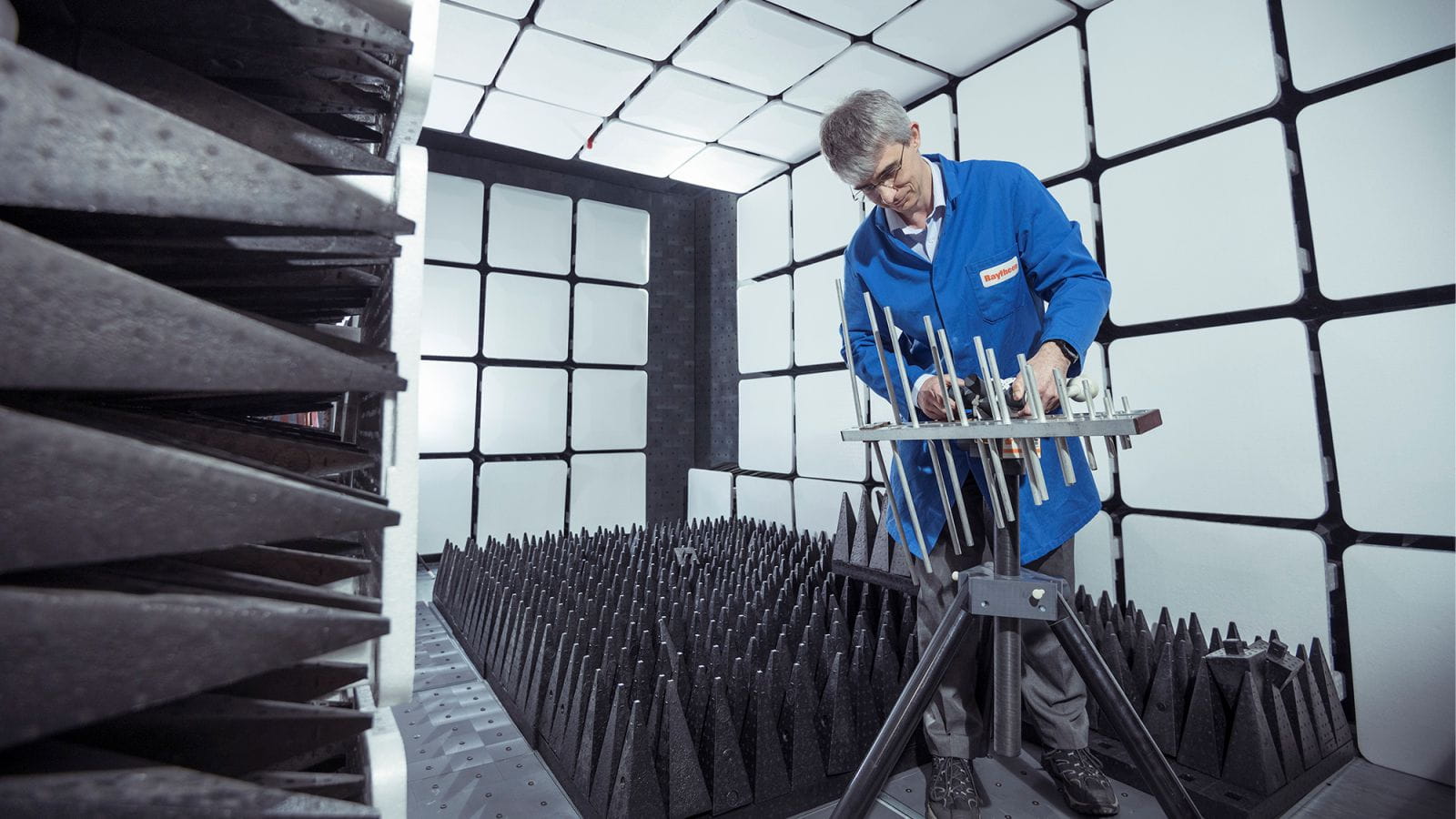 Engineer inspects antenna