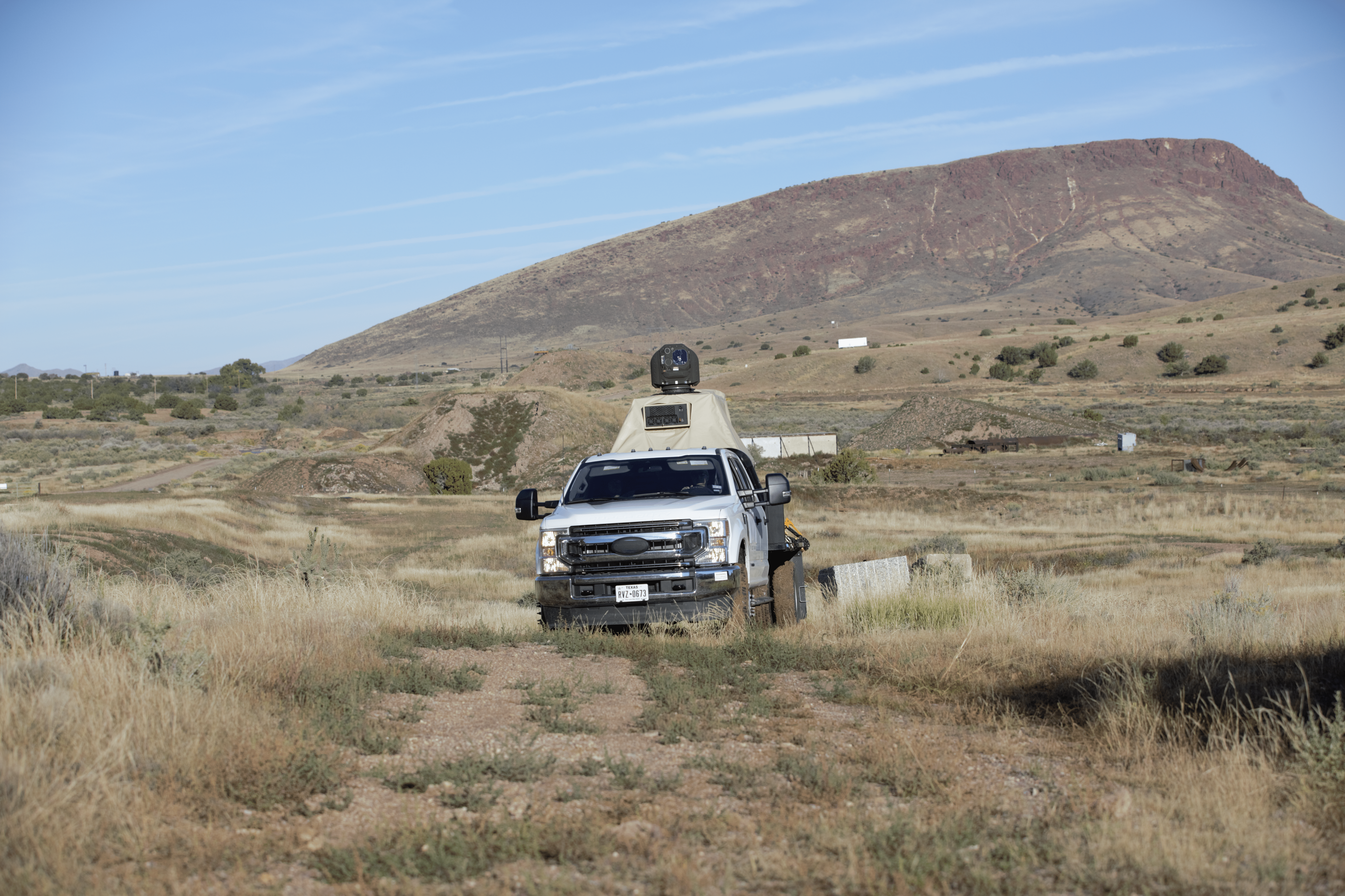 A laser weapon system mounted to a truck