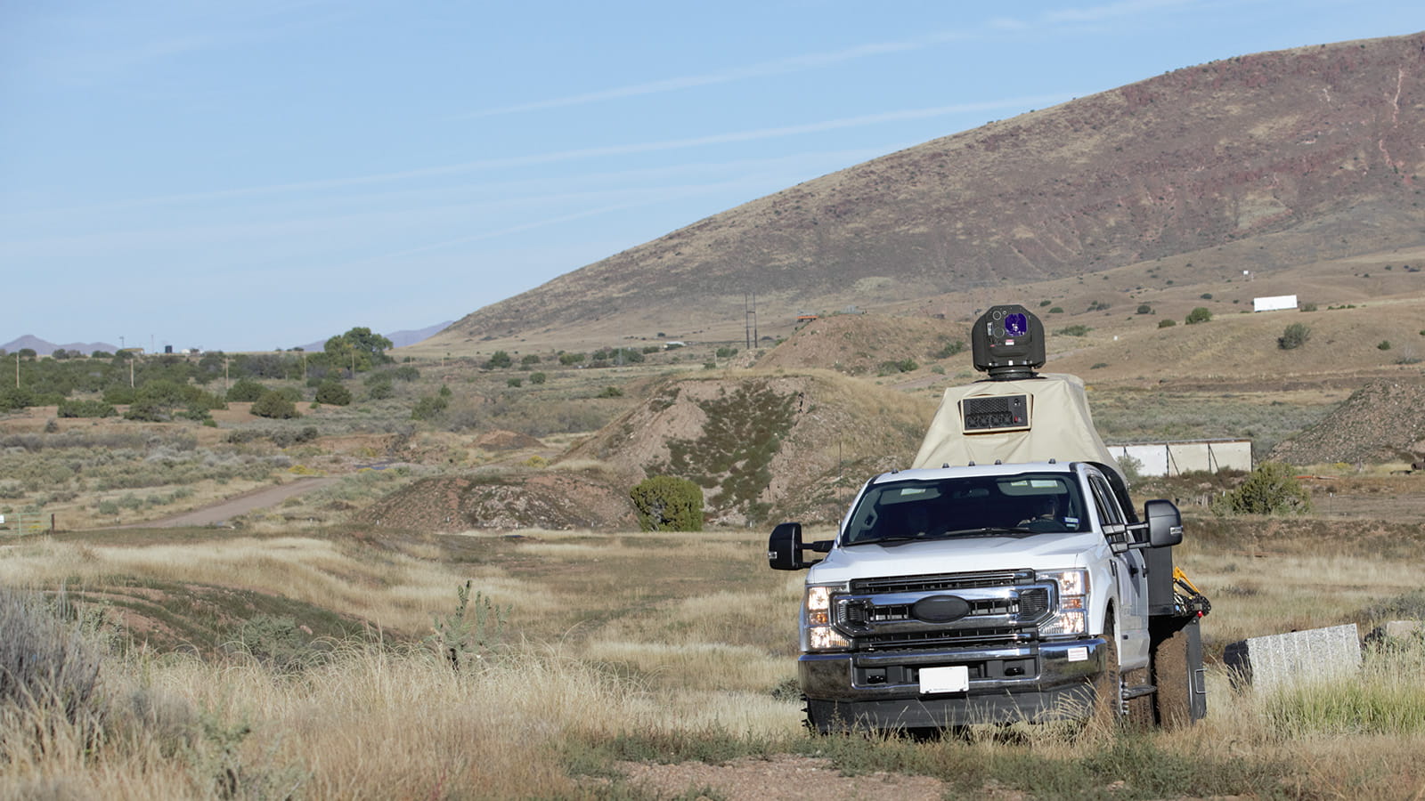 A laser weapon system mounted to a truck