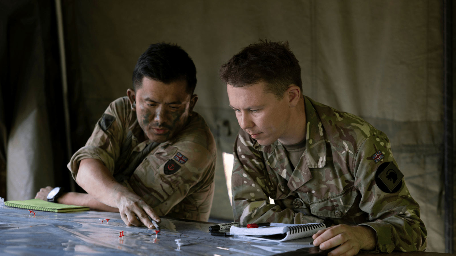 Members of the 4th Light Brigade Combat Team, seen here coordinating deployed assets at field headquarters on exercise ULU WARRIOR in the Brunei jungle.