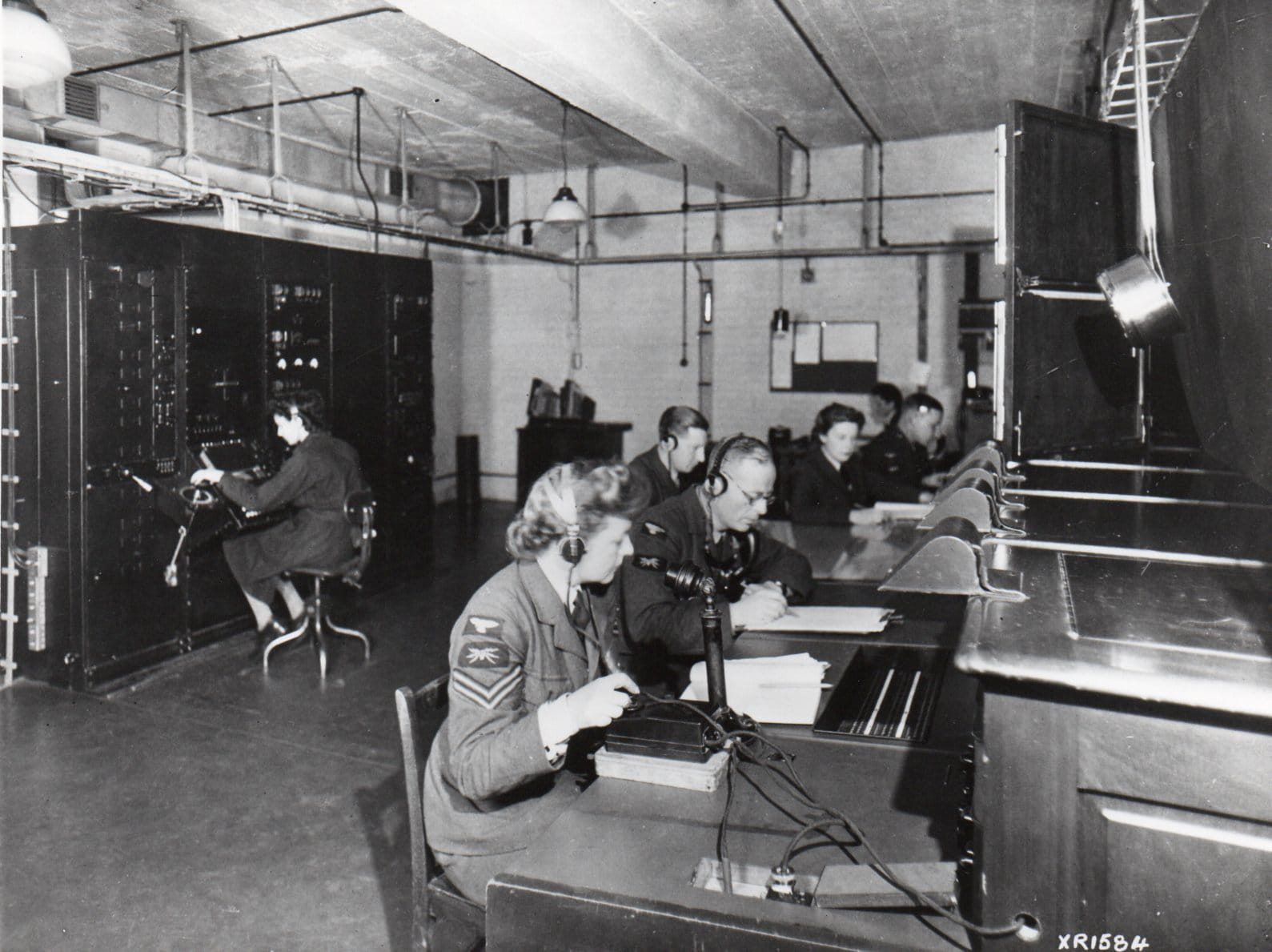Battle of Britain: The Royal Air Force and Women's Auxiliary Air Force personnel working in a receiver room of a radar station  (copyright: Chris Goss)