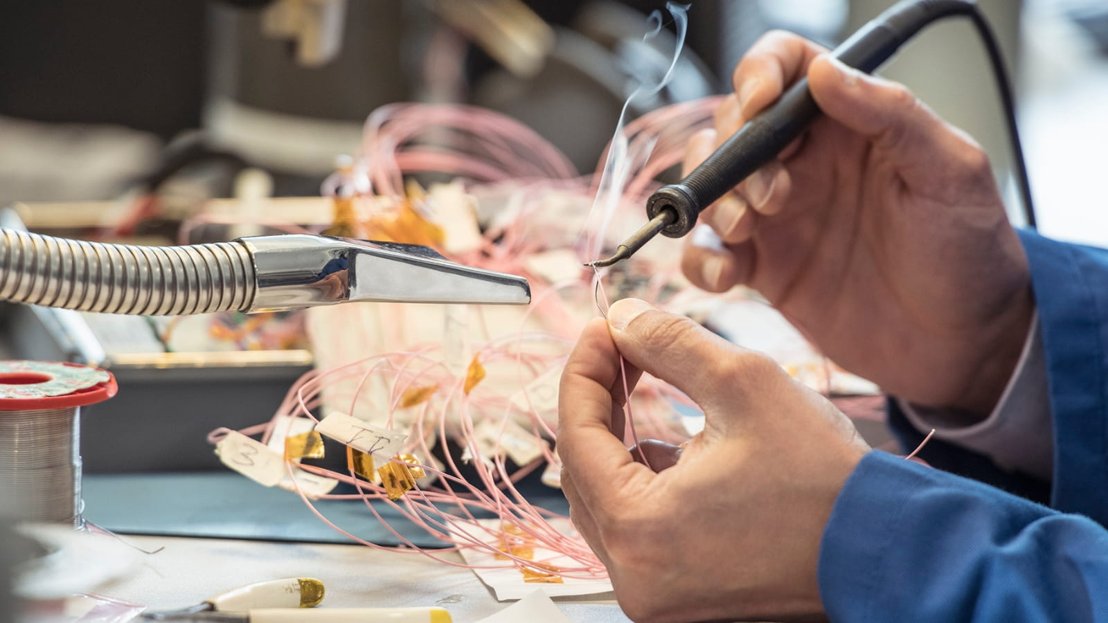 Close-up of an engineer welding wires