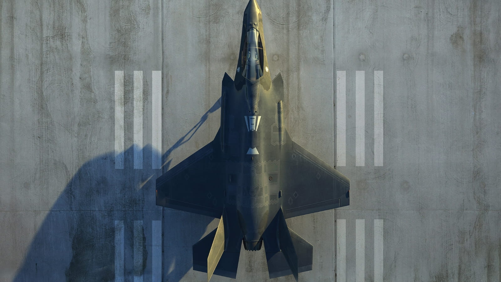 Aerial view of a fighter jet on a runway