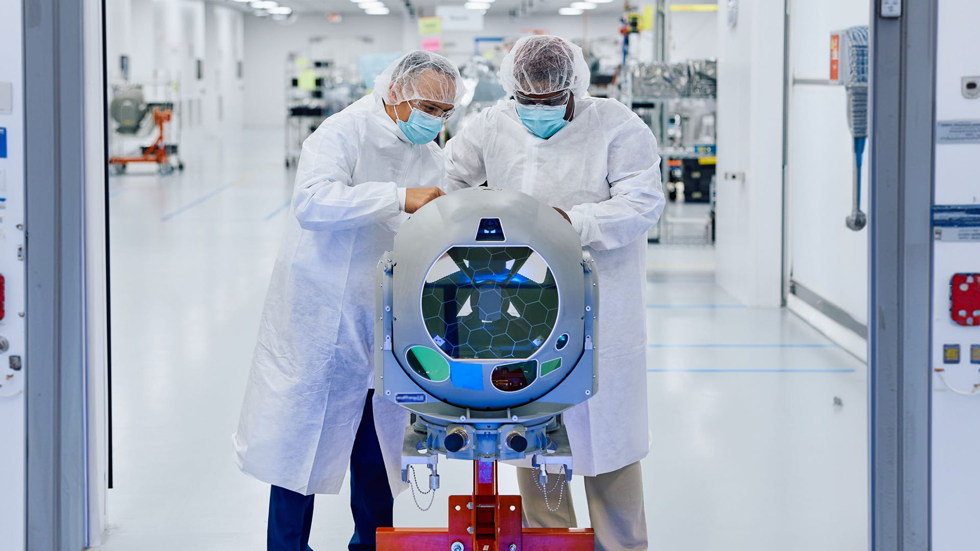 Two technicians in lab coats