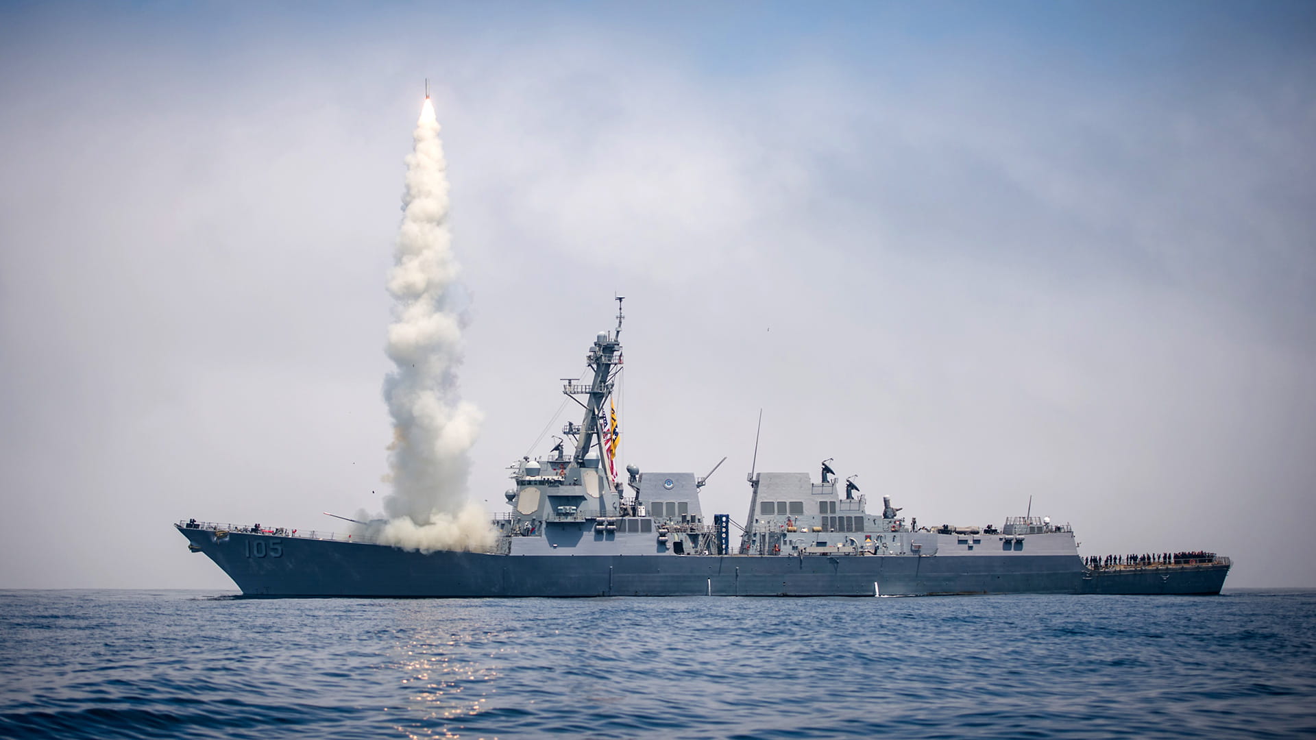 A Tomahawk missile launching from a battleship