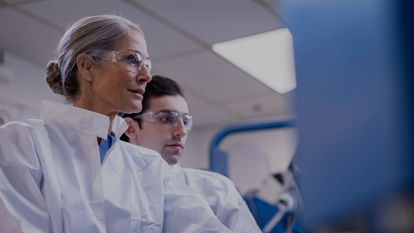 A man and woman in lab coats