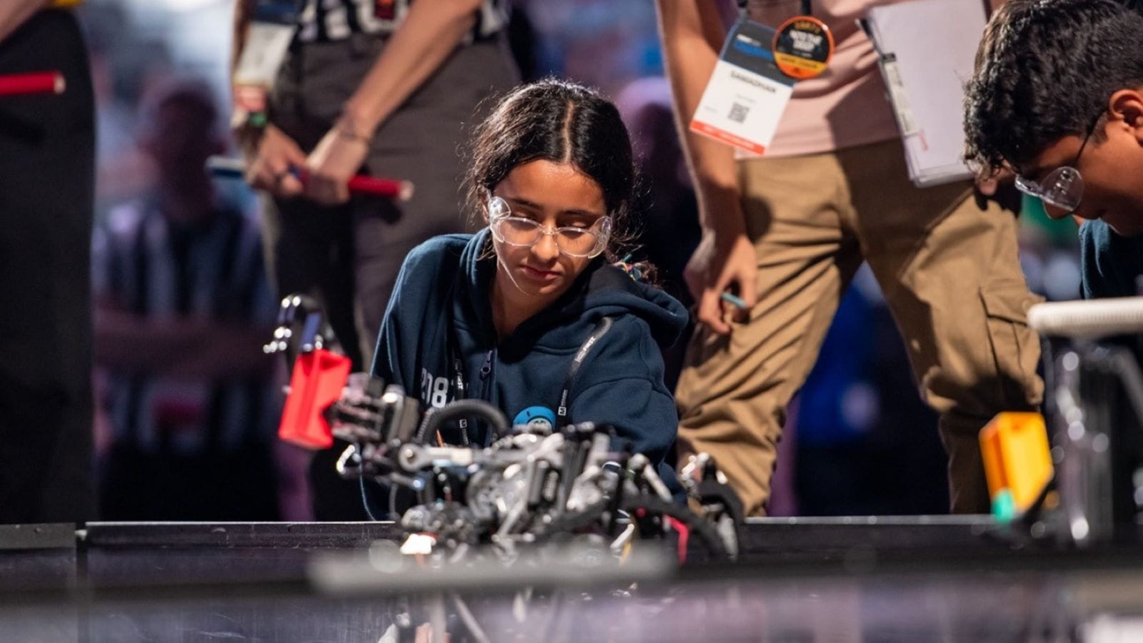 A girl wearing safety glasses