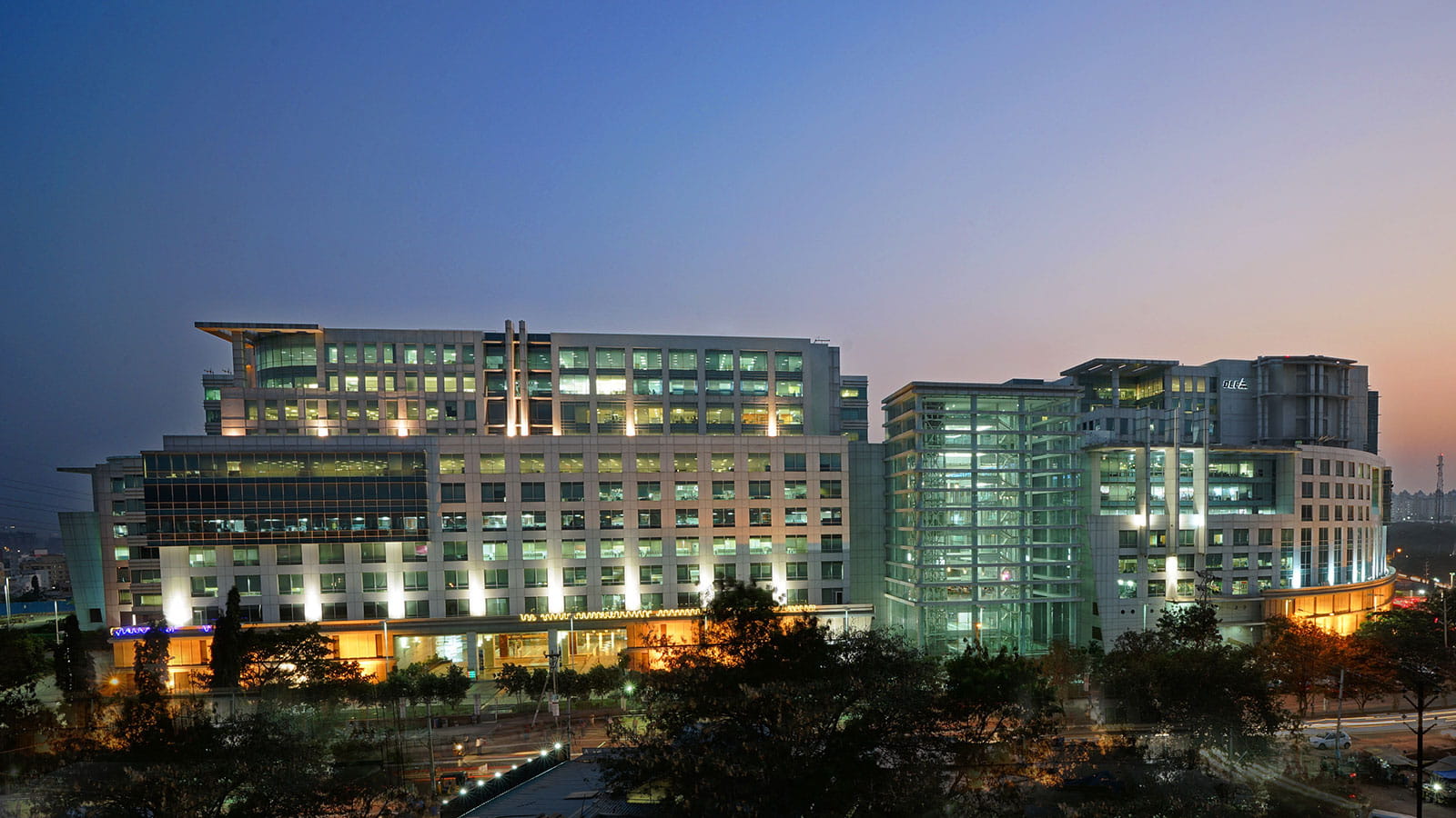 Building lit up during twilight.