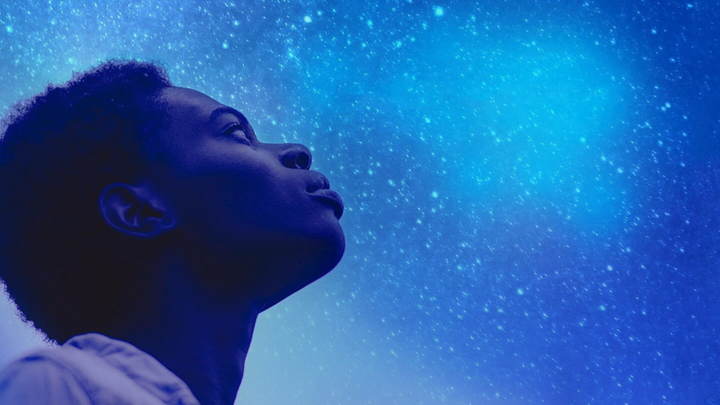 Person gazing into the sky