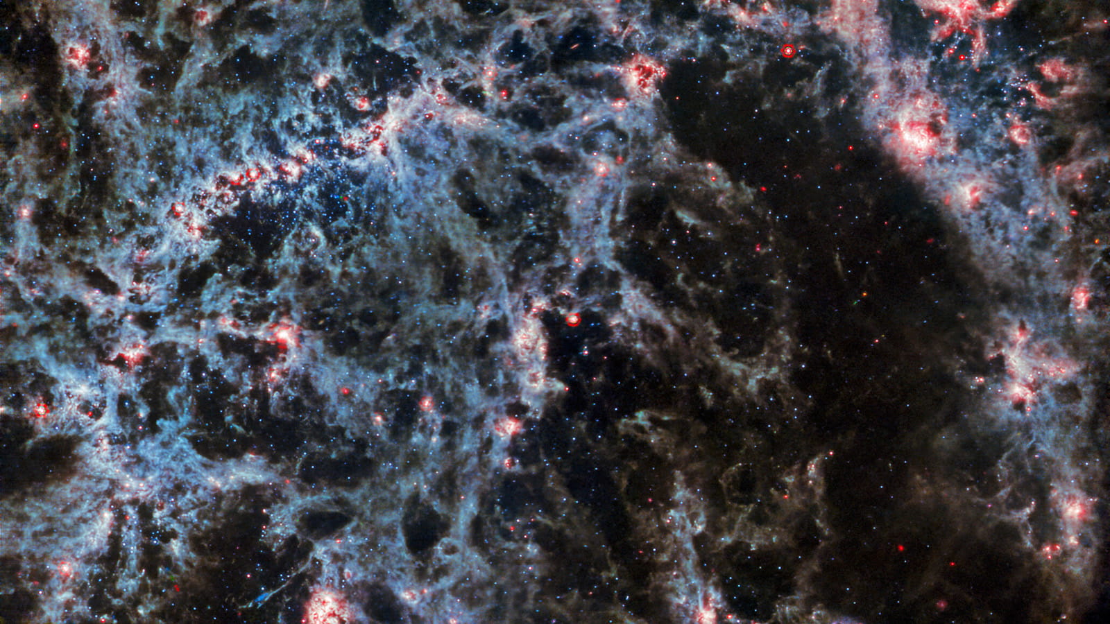 James Webb Space Telescope's mid-infrared image of barred spiral galaxy NGC 5068. Credit: ESA/Webb, NASA & CSA, J. Lee and the PHANGS-JWST Team