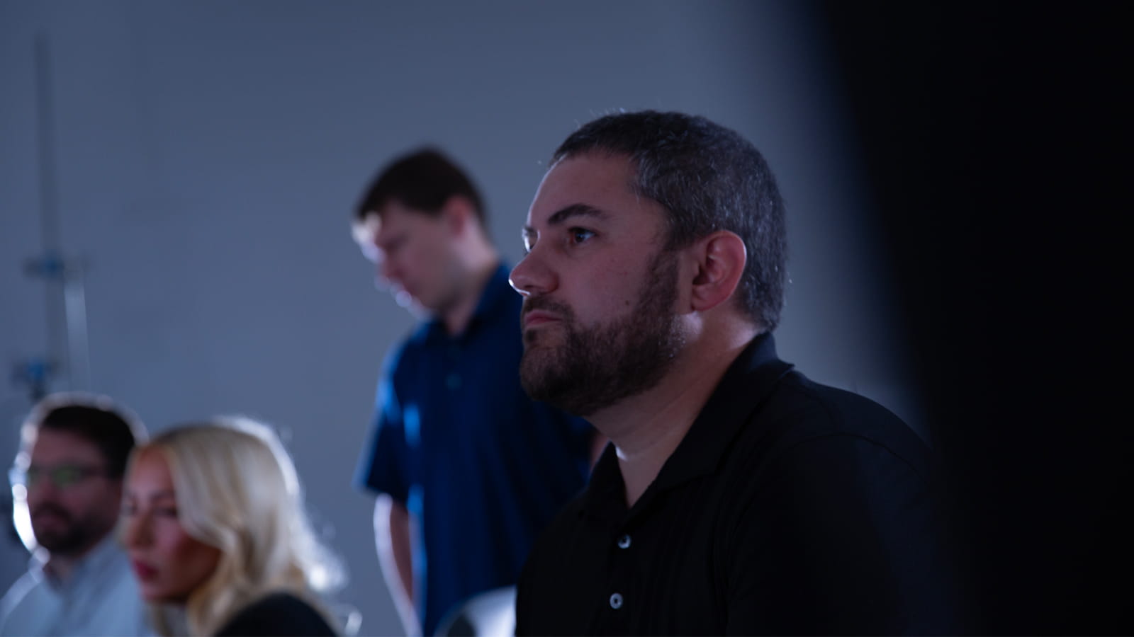 team members working in the control room at The Collins Aerospace facility in Rockford