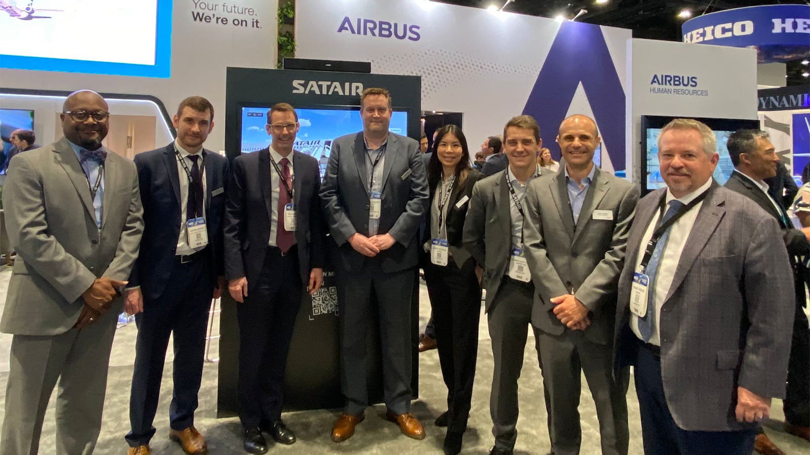 Collins and Satair leaders participate in a signing ceremony at MRO Americas