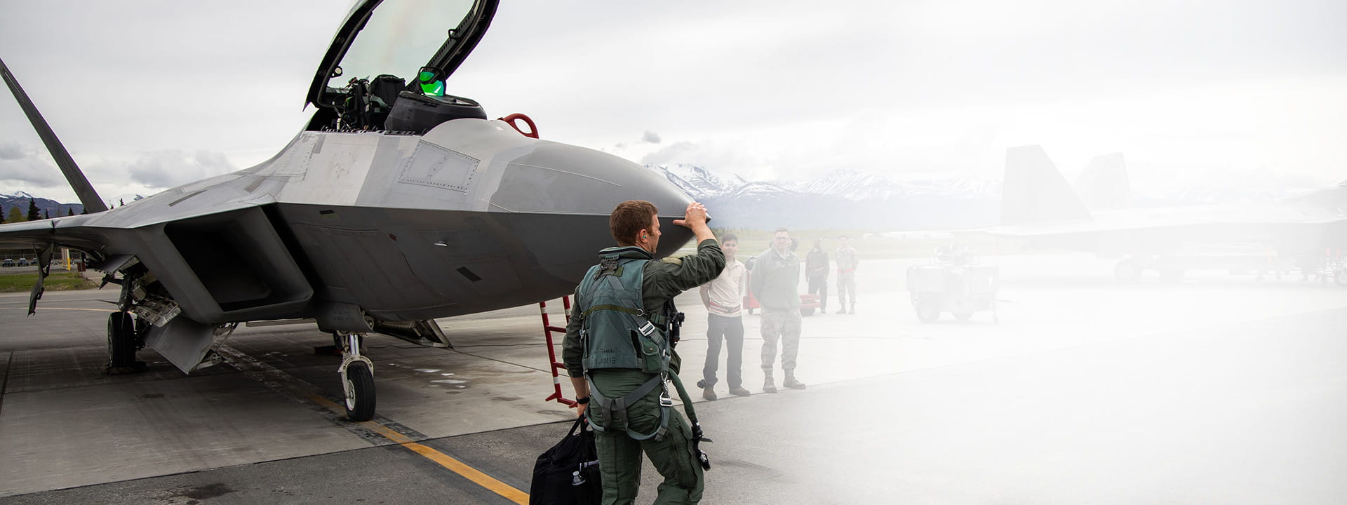 John Rogers with parked F-22