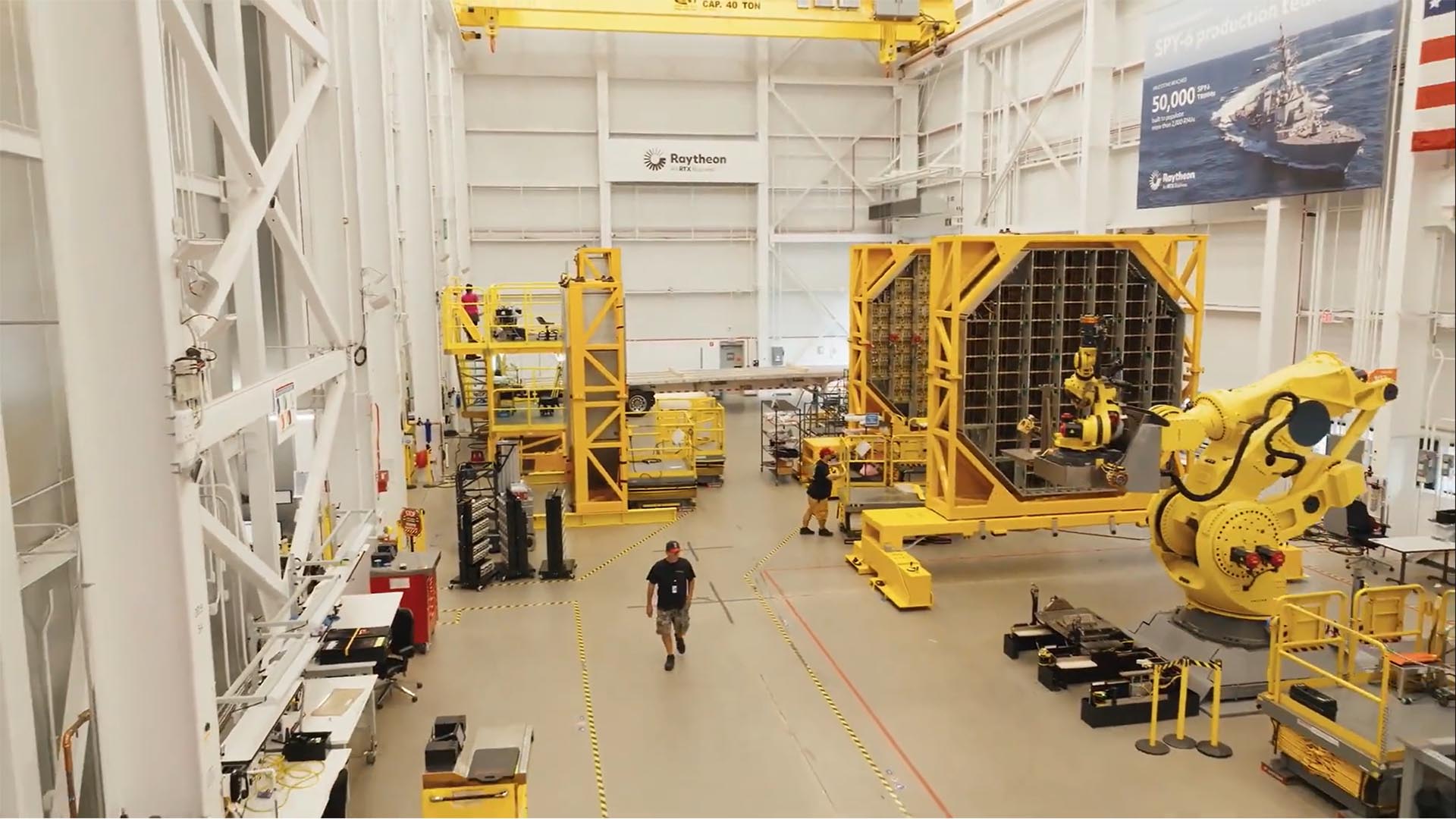 man walking in the SPY6 radar facility