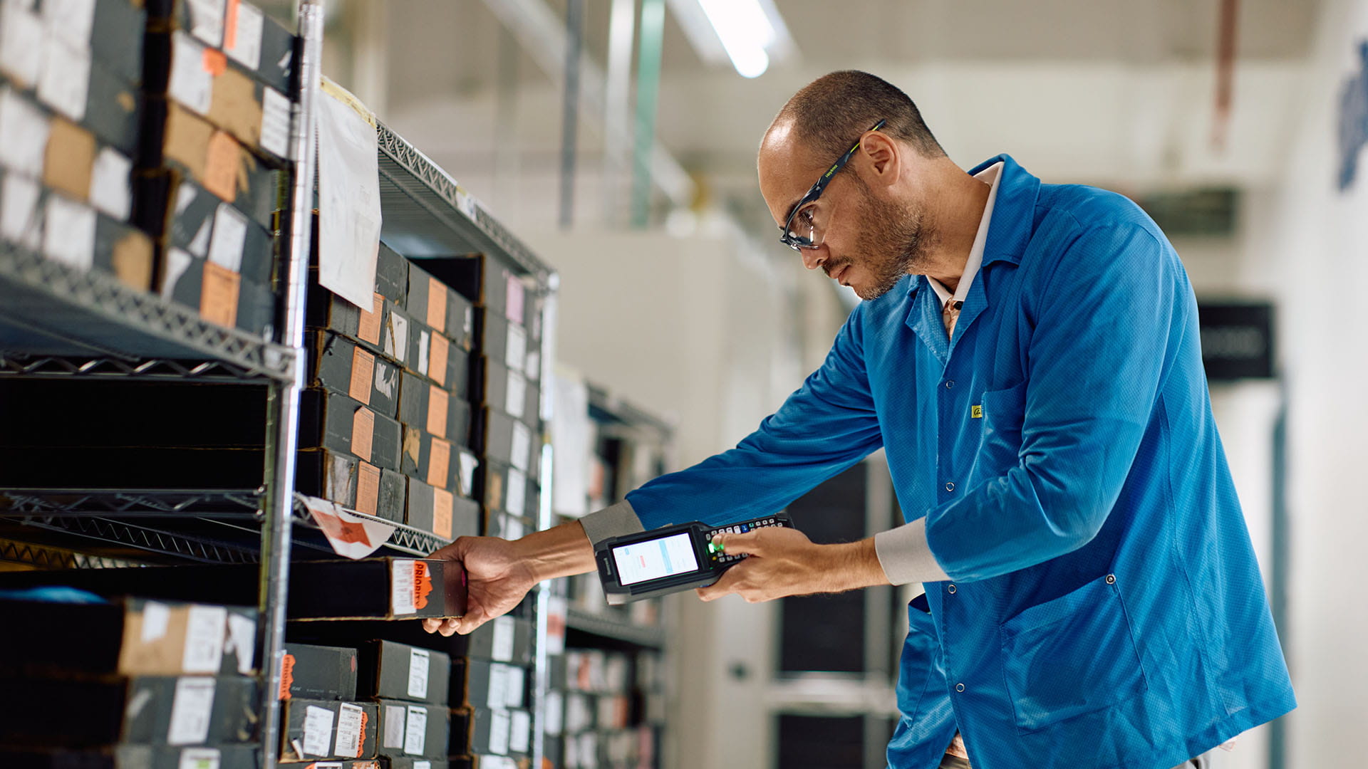 a worked scans a box