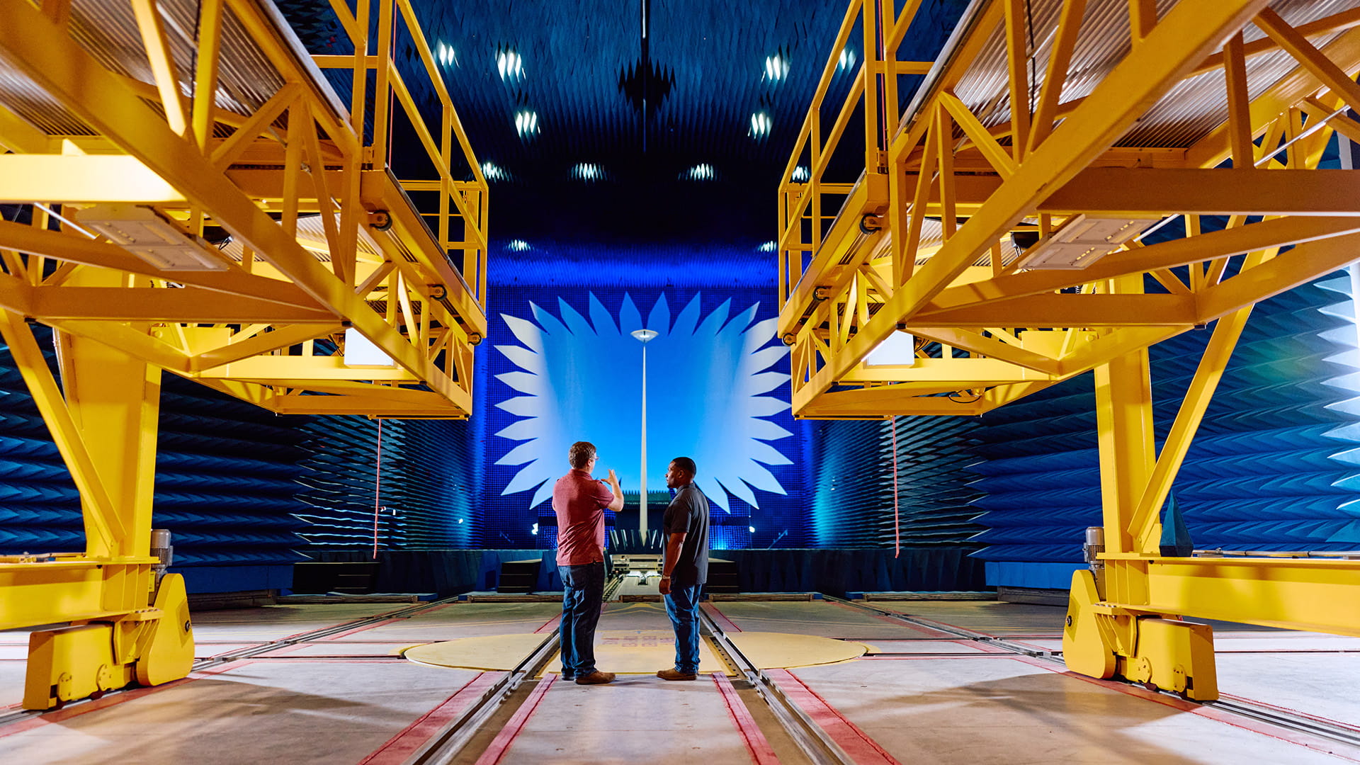 Two employees monitoring radar test