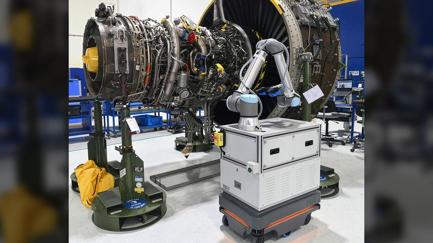 an autonomos robot inspects an aircraft engine