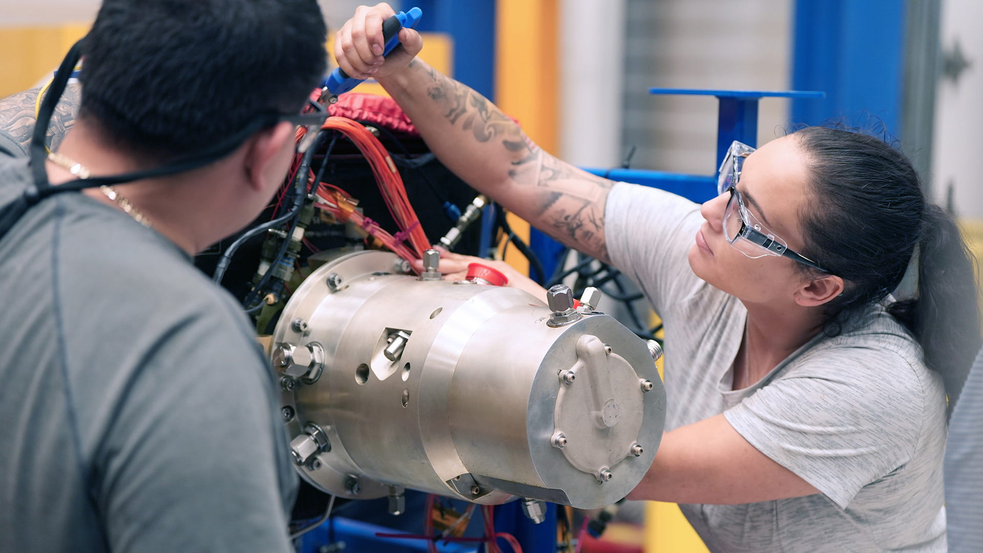 Technicians working on a Collins EPACS
