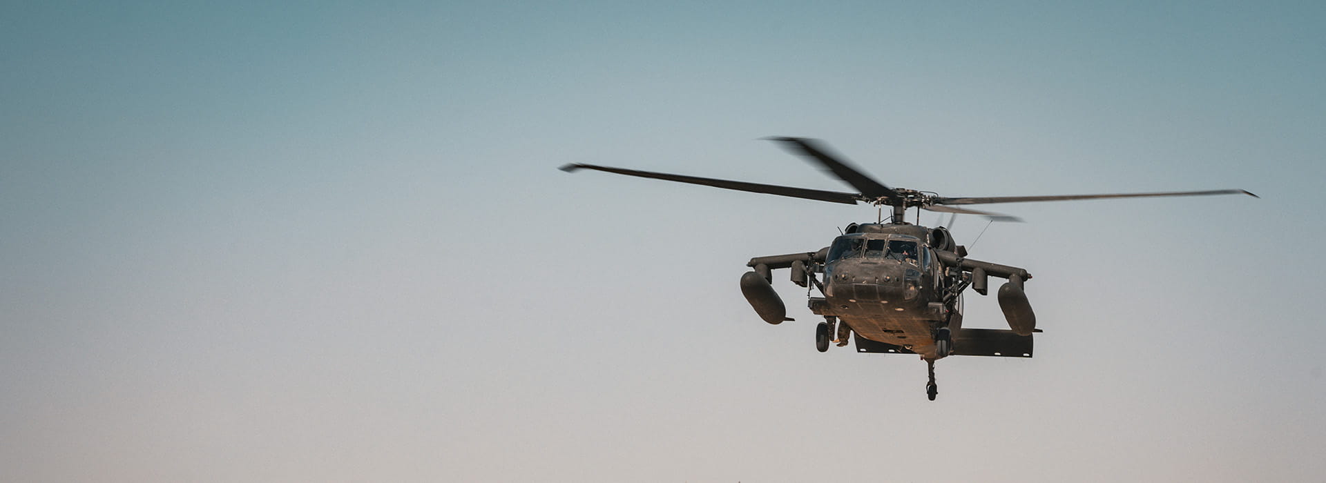 Helicopter in blue sky